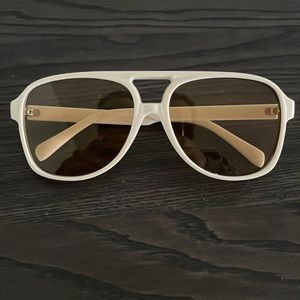 Cream frame plastic aviator glasses with lightly tinted lenses